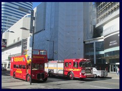 Dundas Square - Eaton Centre, Nordstrom, fire engince and tourist double decker